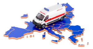 Ambulance driving over a map of the European Union