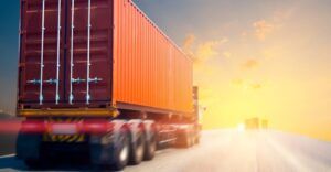 A semi-truck hauling a shipping container
