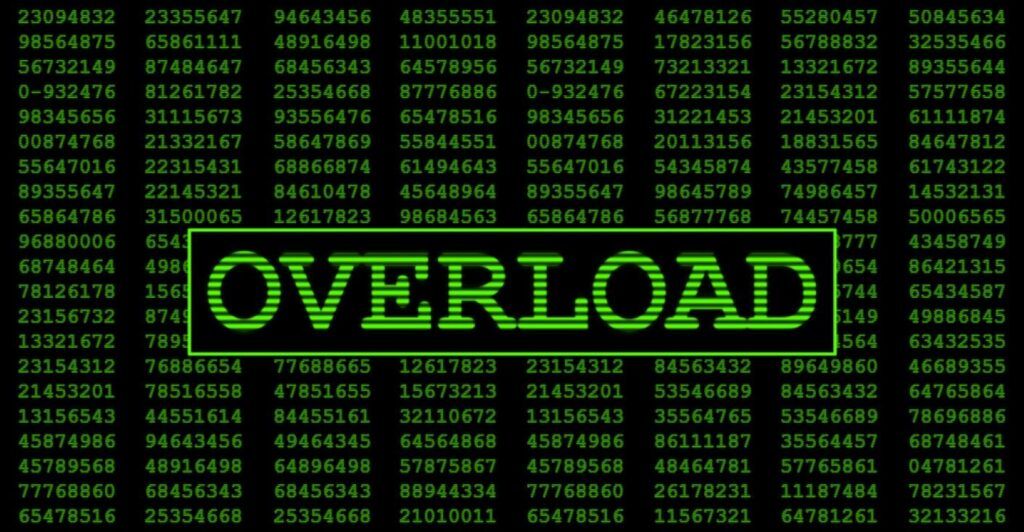A computer screen with hundreds of lines of code and the word "Overload".